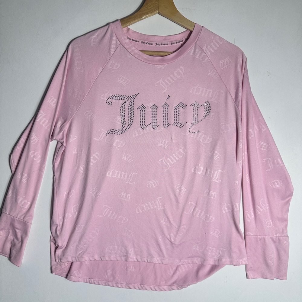 This pink, long-sleeve top is a Juicy Couture velour rhinestone logo